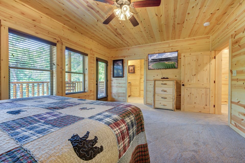 King bedroom on the lower level has an attached bathroom and a smart tv
