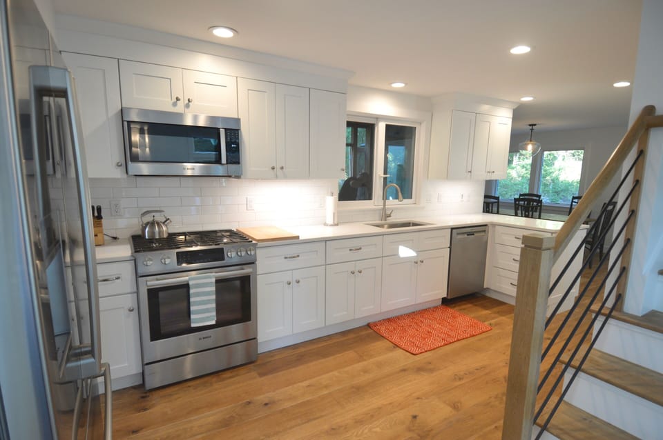 another view of modern kitchen with stainless, high-end appliances
