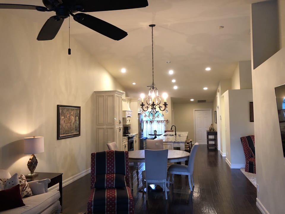 Dining table and expansive, open kitchen