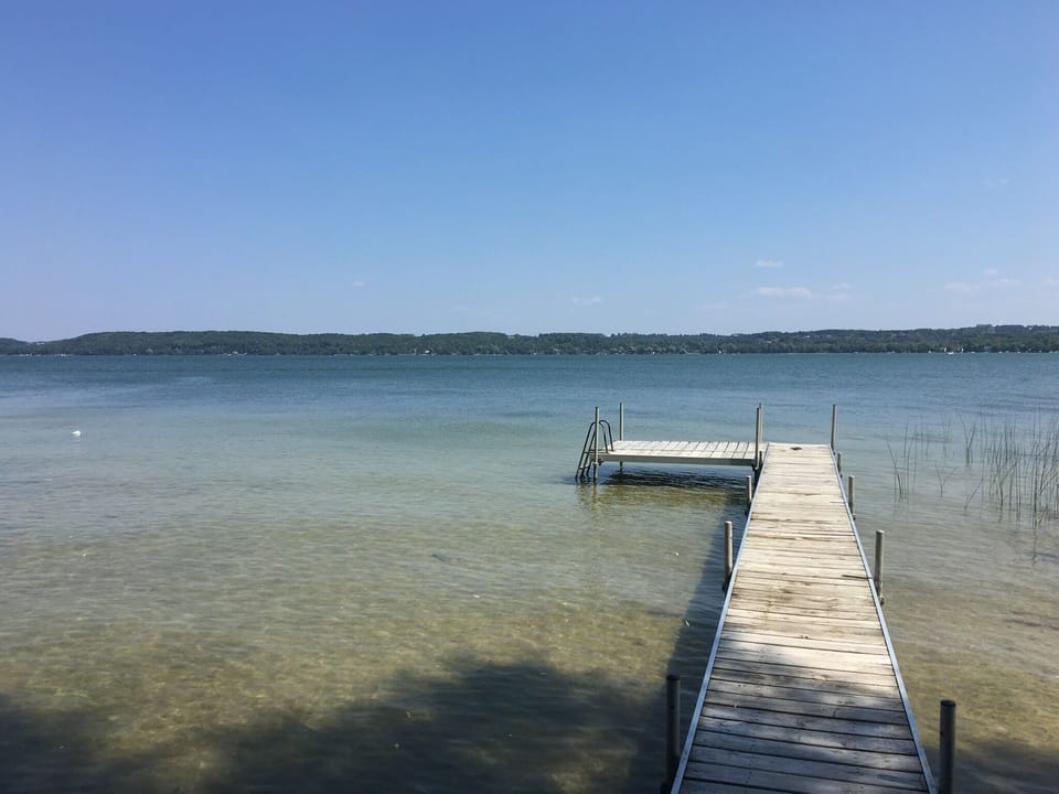 Sandy bottom lake in front of cottage