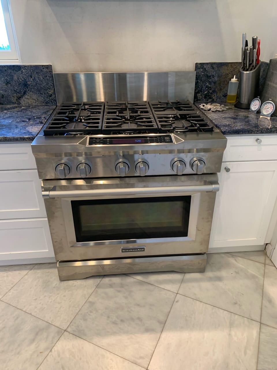 Gas stove with electric oven