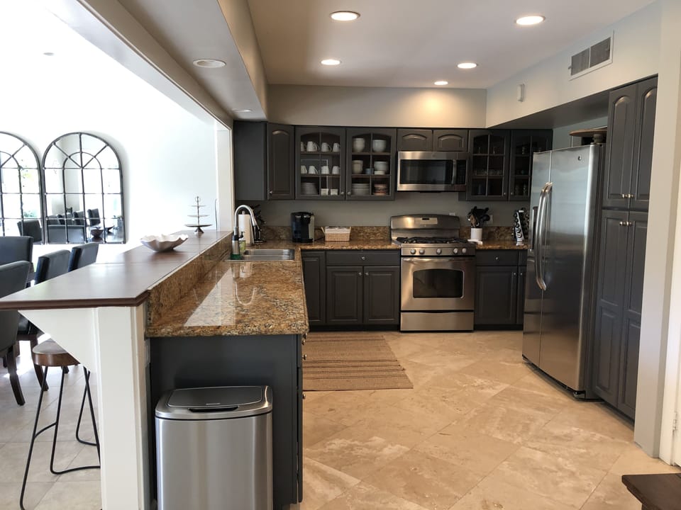 Kitchen well-appointed with service for 12,  appliances, serving dishes