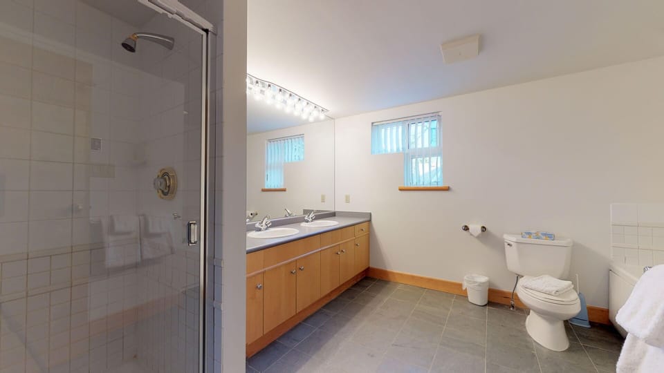 Unwind after the day in the oversized tub or spacious walk-in shower.