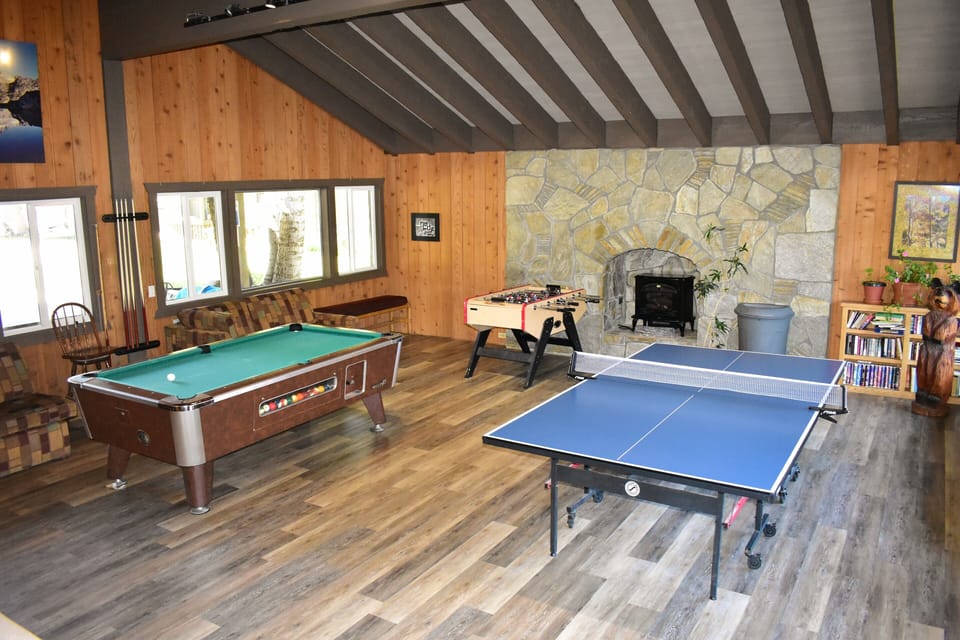 Game room with pool, ping pong, and foosball