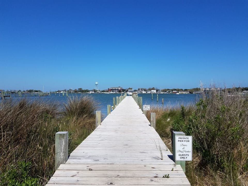 Dock with Fish Bench and Two Slips Available on Right Side