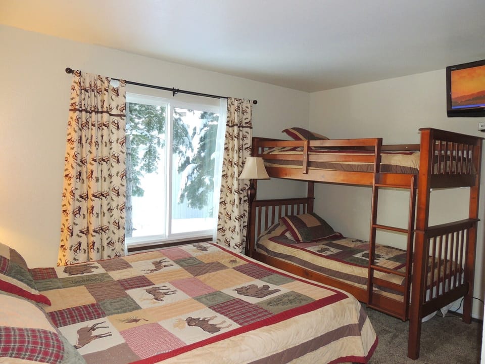 2nd bedroom with queen and bunk bed