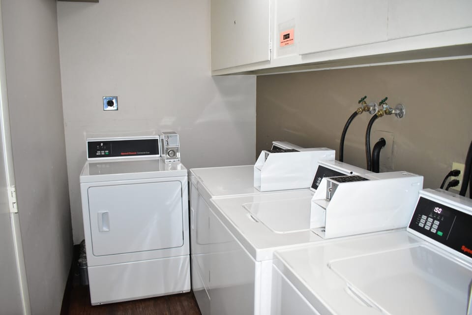 Coin operated laundry room