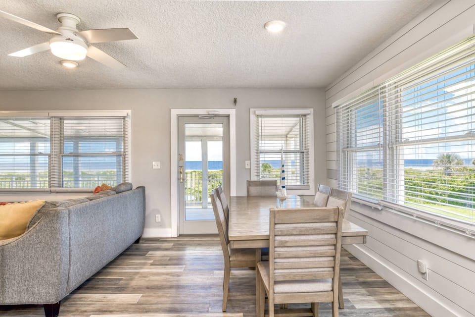Gather around the table for good food and conversation, and then step outside onto the large porch to breathe in the fresh ocean air!