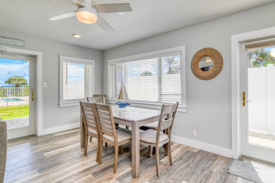Gather around the dining table to enjoy good food and conversation! Step outside to the large patio to breathe in the ocean air!