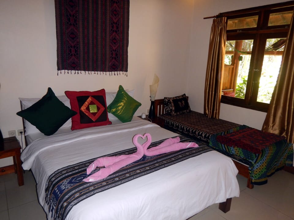 One room has a queen and single bed suitable for 3 guests