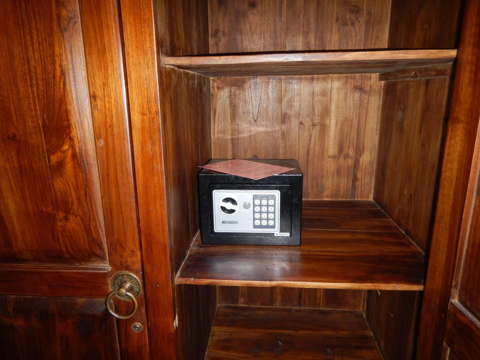 Safety box provided inside the teak wardrobe.