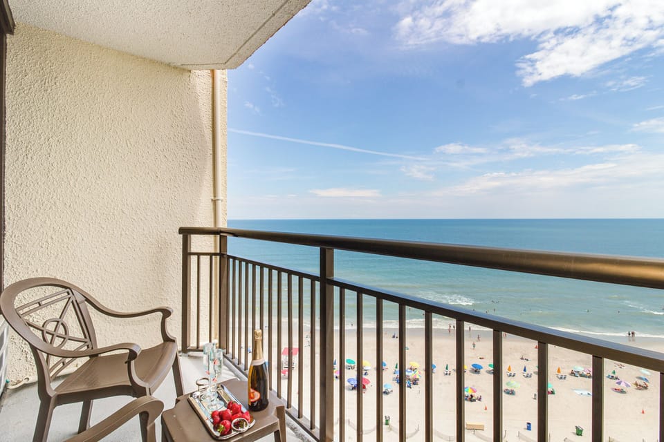 Enjoy the fresh air and sunshine in this cozy balcony oasis!