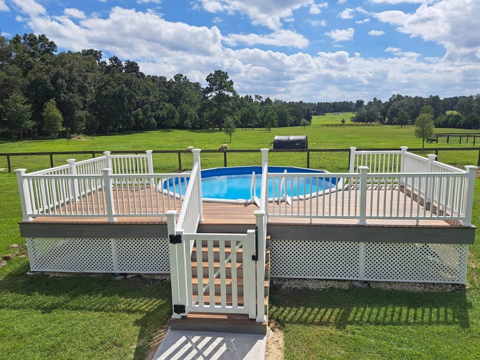 Pool and Deck with beautiful views over rear pasture