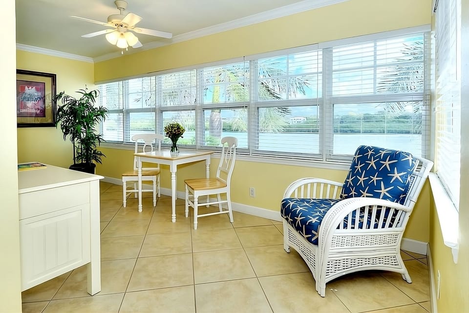 Sip morning coffee in sunlit seating with calming views.
