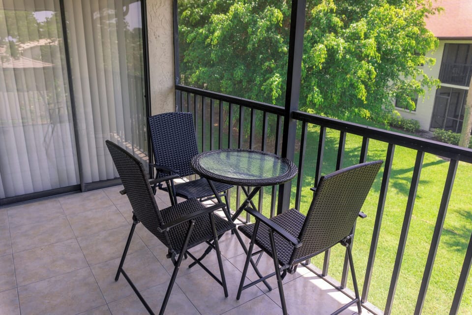 Sip morning coffee on the breezy balcony bistro set
