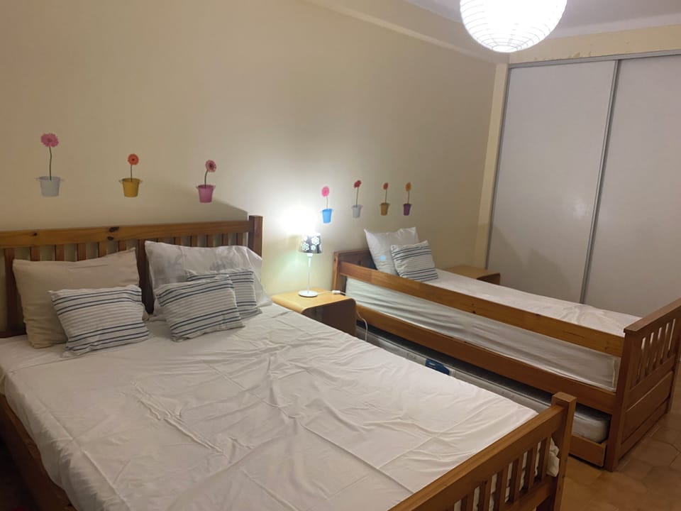 One double-bed and two single beds and a spacious wardrobe