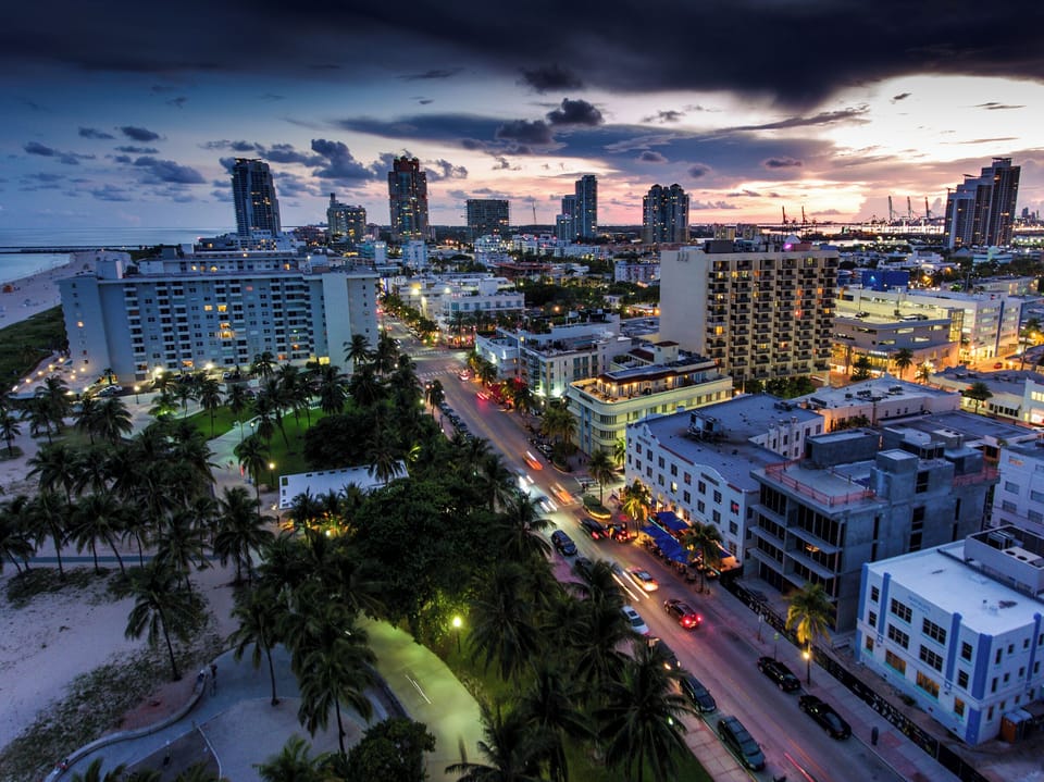 Take in dazzling city lights after a day by sea.