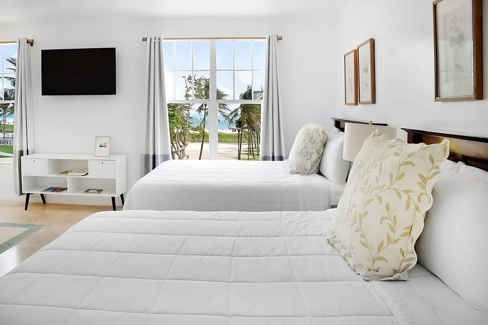 Wake up to ocean breezes from bright, airy beds.