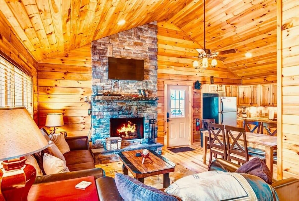 Living room with stone fireplace 