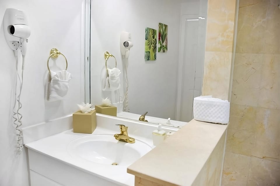 Get ready quickly with convenient counter space and warm lighting.