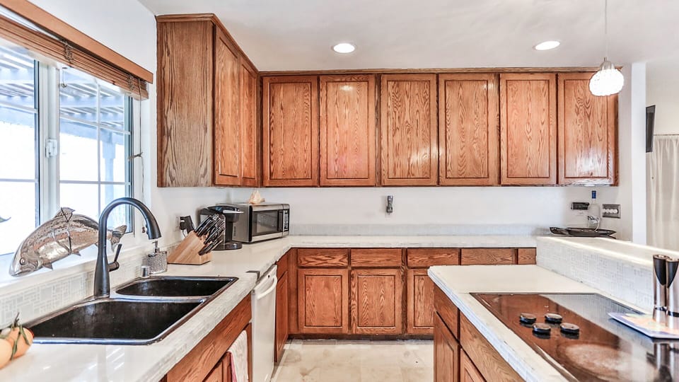 KITCHEN TURN KEY FULLY EQUIPED MOSAIC TILES. IS PART Of GREAT ROOM.