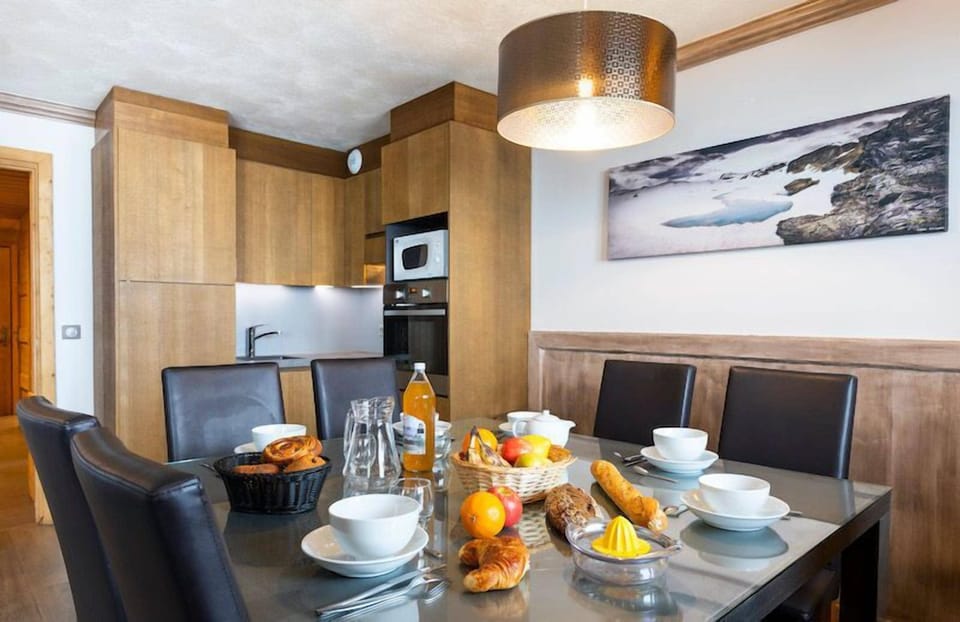 Enjoy a delicious meal at the dining table.