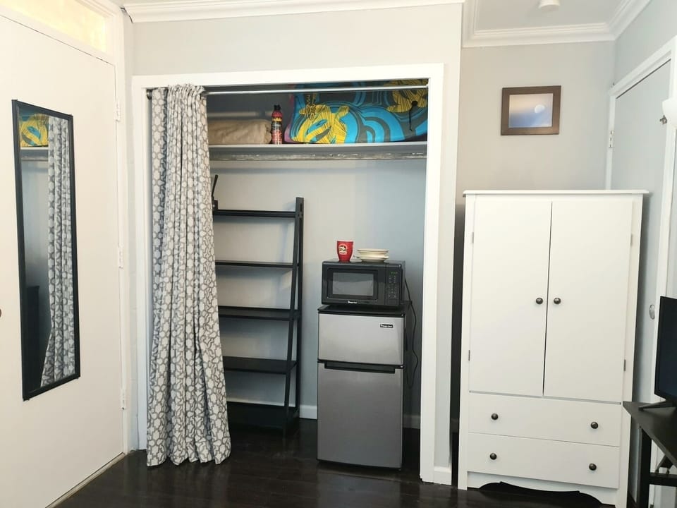 Closet and storage. Microwave and refrigerator/freezer. Boogie Boards.