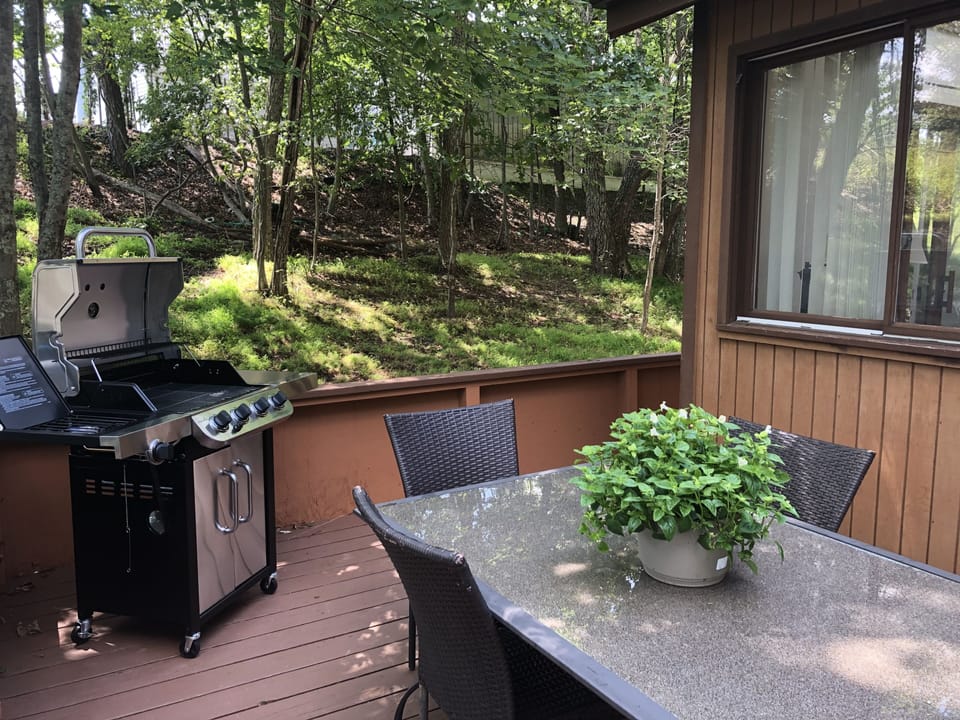 Patio deck with grill and dining area