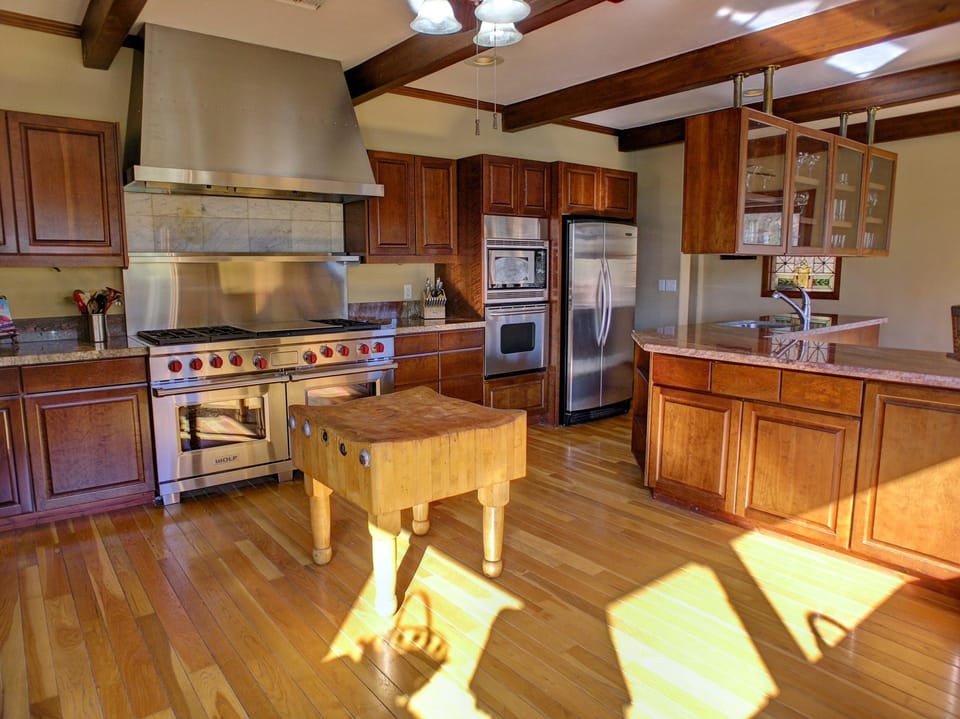 KITCHEN: Wolf 6 Burner Duel Fuel Range, 2 ovens, 2 dishwashers and 2 refrigerators.