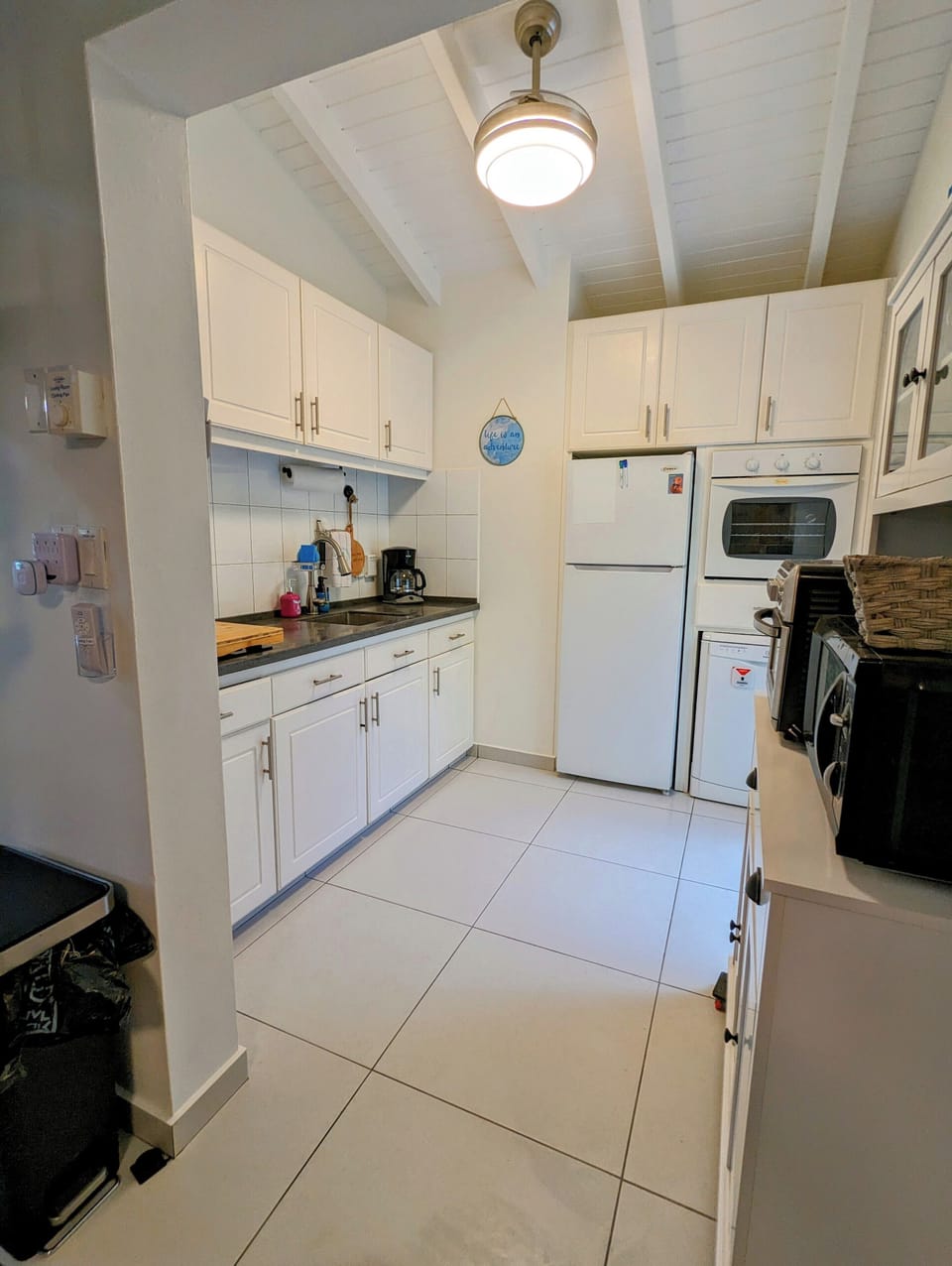 New refrigerator and dishwasher.  Ceiling fan. Under cabinet lighting. 