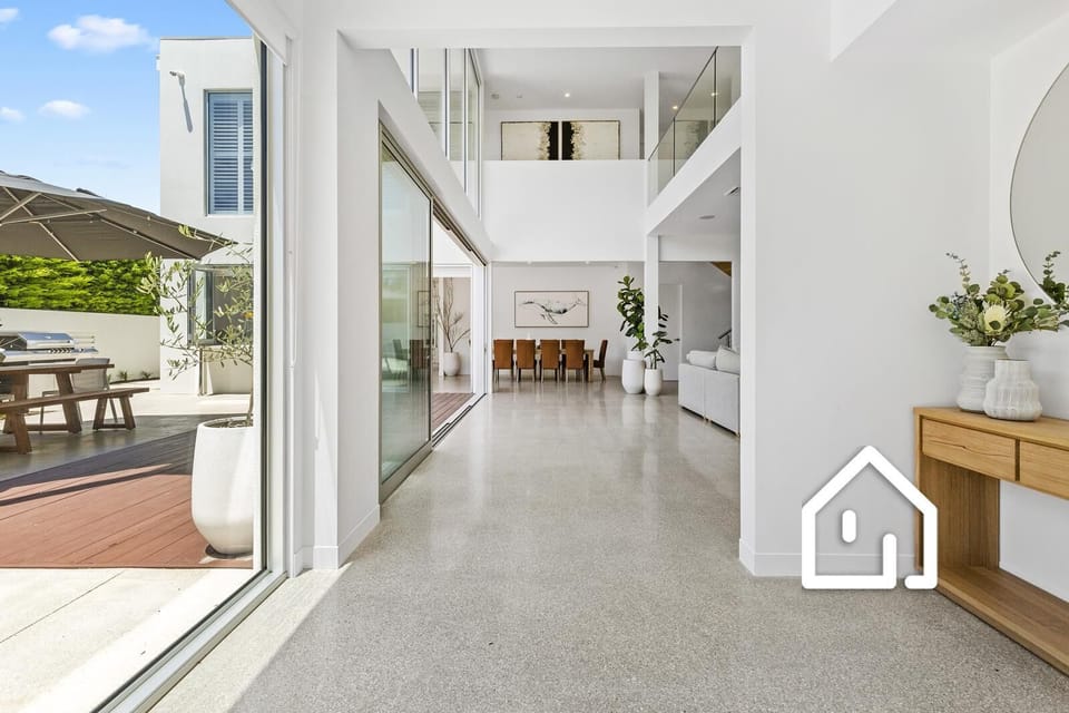 Entrance hallway with stunning north facing double storey windows