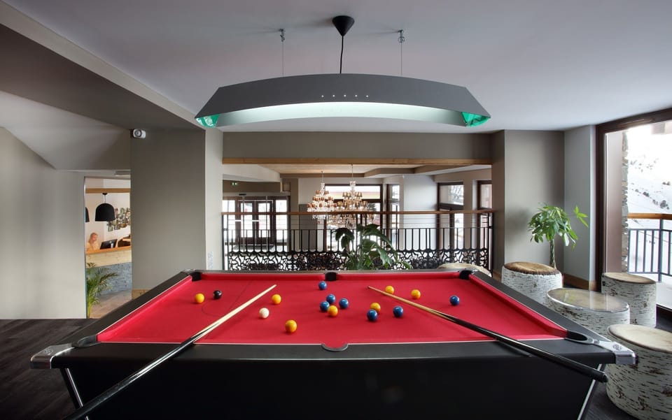 Shoot some pool with your group in the communal lounge.