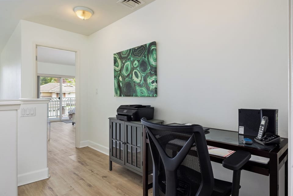 Desk and printer on landing leading to main bedroom