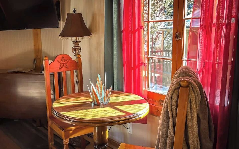 A cheerful and rustic decor style is featured throughout the cabin.