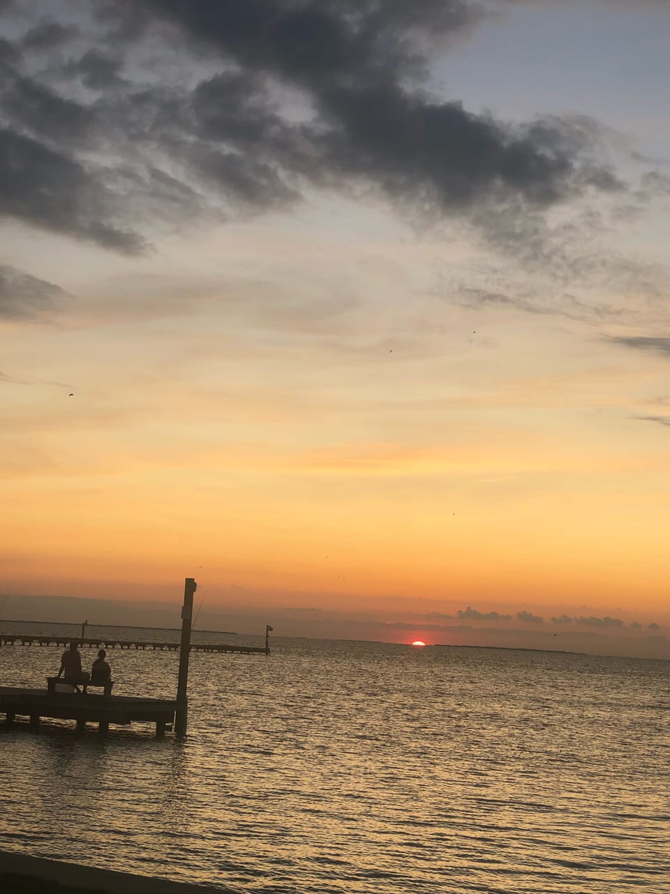 breathtaking sunset views from the balconies or from the pier across the street