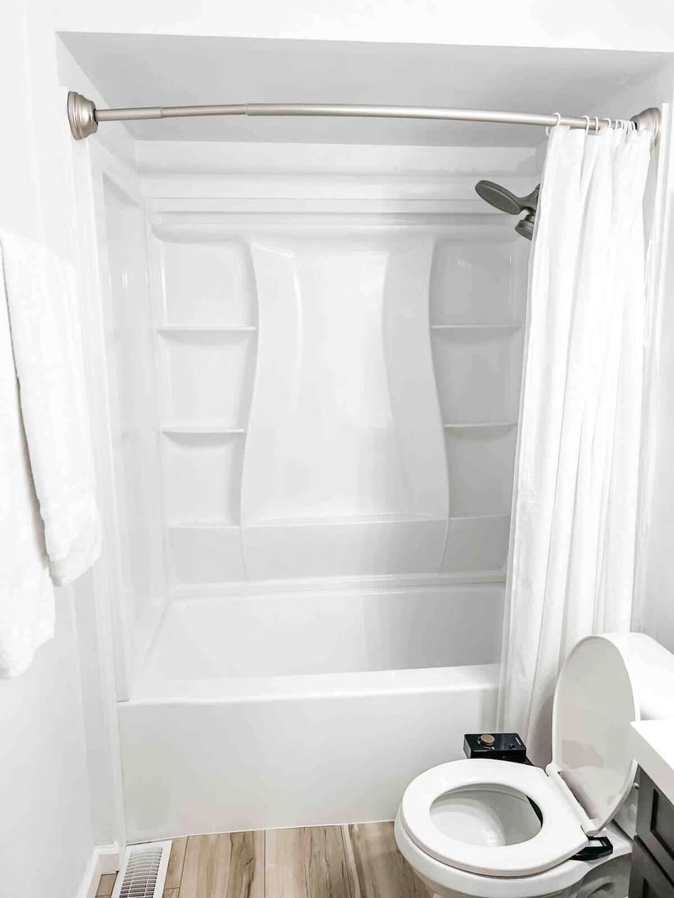 Brand new shower & floors in this fresh bathroom 