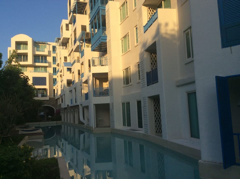The Che pool access beachfront by Away