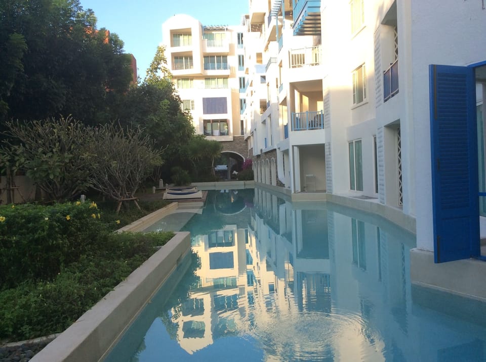 The Che pool access beachfront by Away