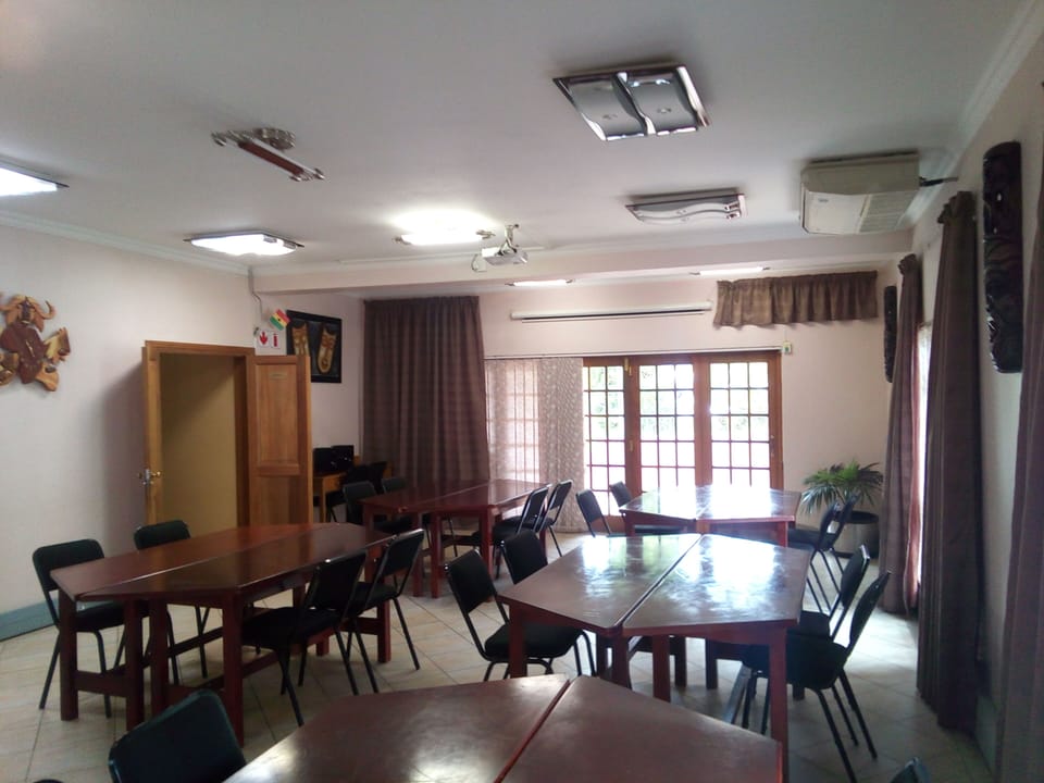 CONFERENCE RM;  Drop down screen; Projector; Air-conditioned; Seats Max 50