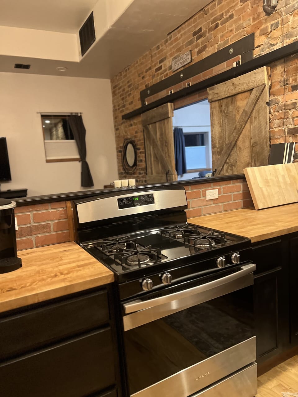 Full size stove/oven, stocked with kitchen essentials to cook anything you want 