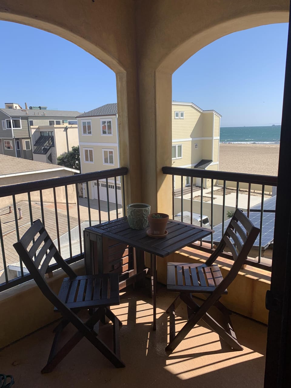 Private balcony in upstairs bedroom with view  of the ocean