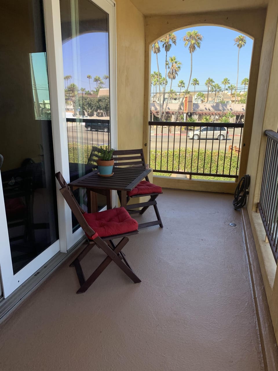 Balcony off living/kitchen area with seating 