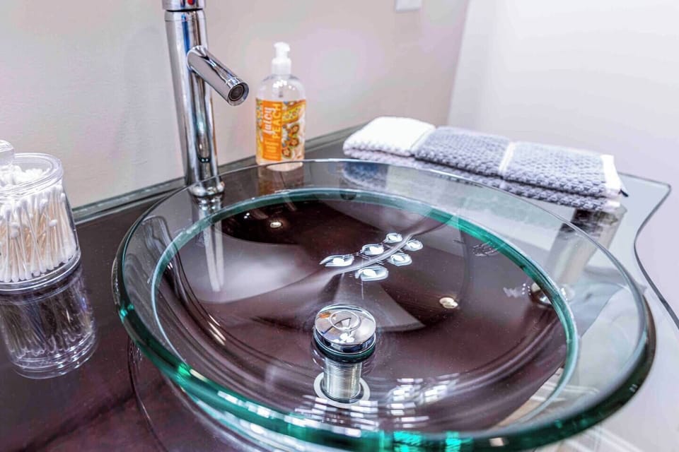 We absolutely love this cool sink and our modern bathroom vanity!