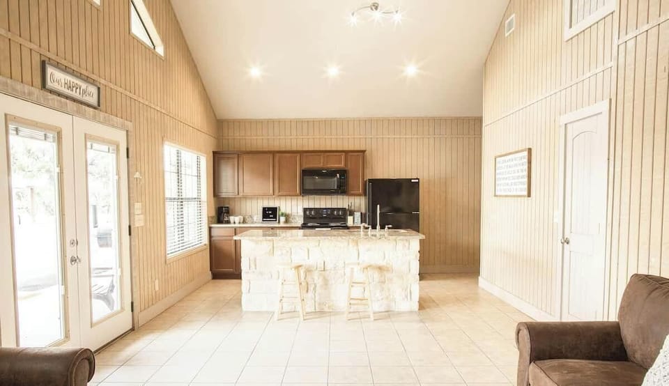 Kitchen....we have a picnic table in this house for dining.