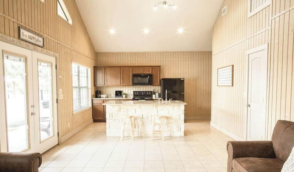 Kitchen view....there is a picnic table in this house for dining.