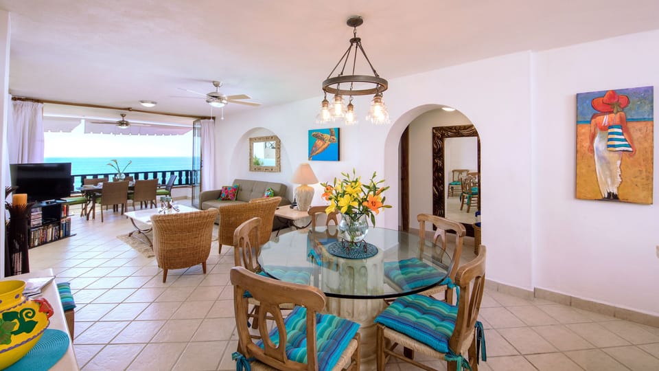 dining & living area with view of ocean