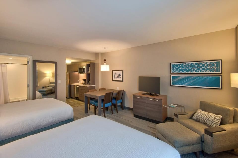 Unit with 2 Queen size beds and 1 sofa bed