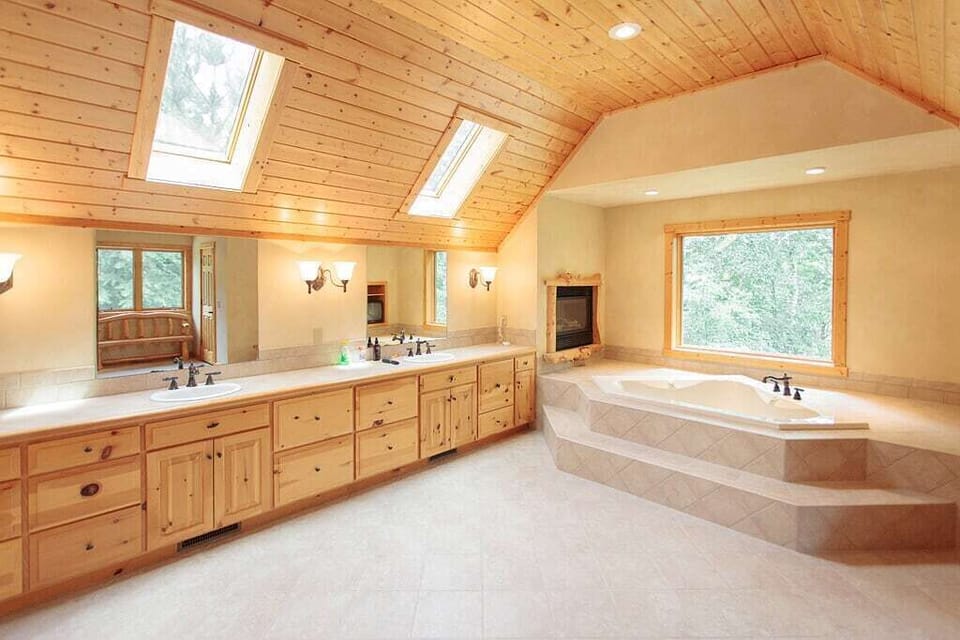 Master bath has jetted tub gas fireplace