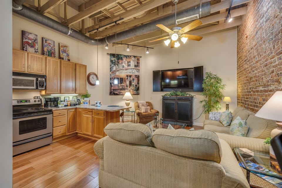 The beautiful space features a gourmet kitchen with lovely custom cabinetry. 
