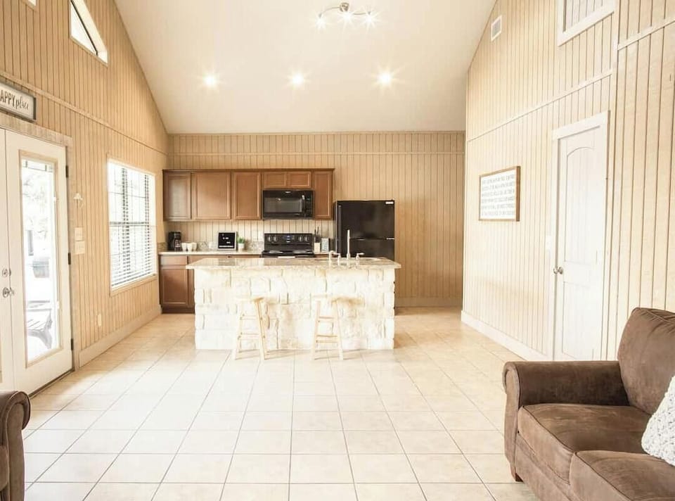 Kitchen....we have a picnic table in this house for dining.